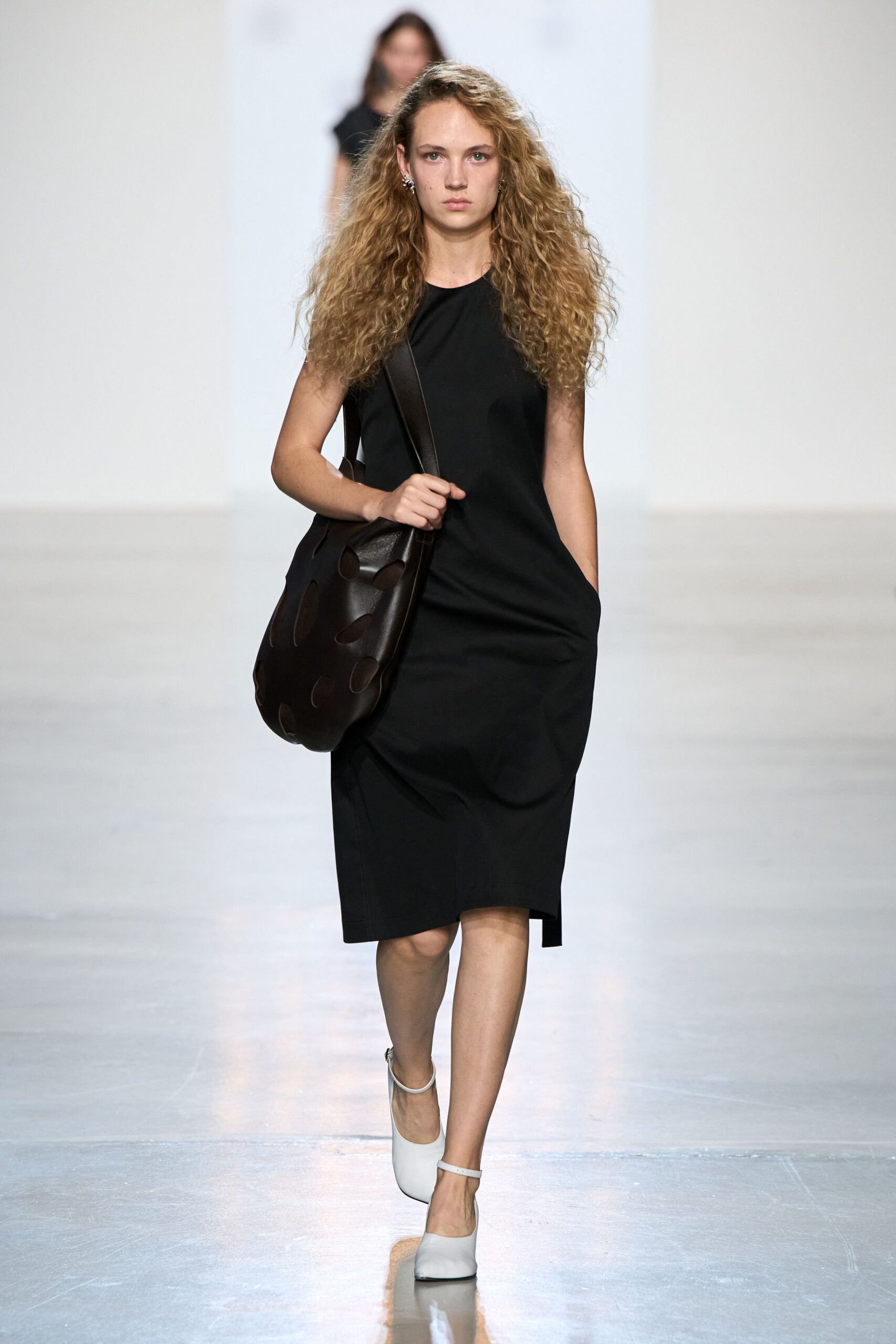 black sleeveless draped midi dress