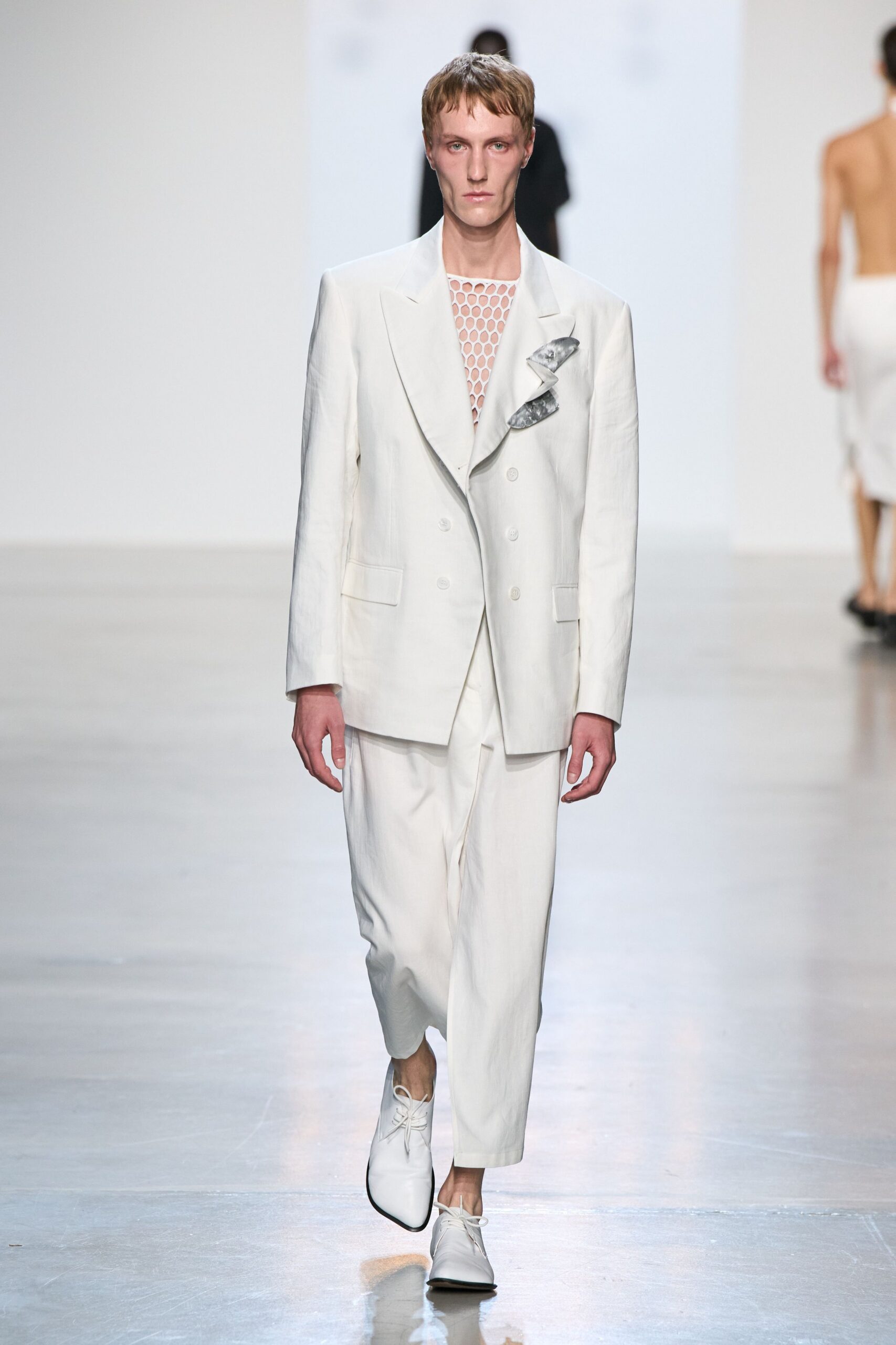 white long-sleeve collared oversized buttoned blazer