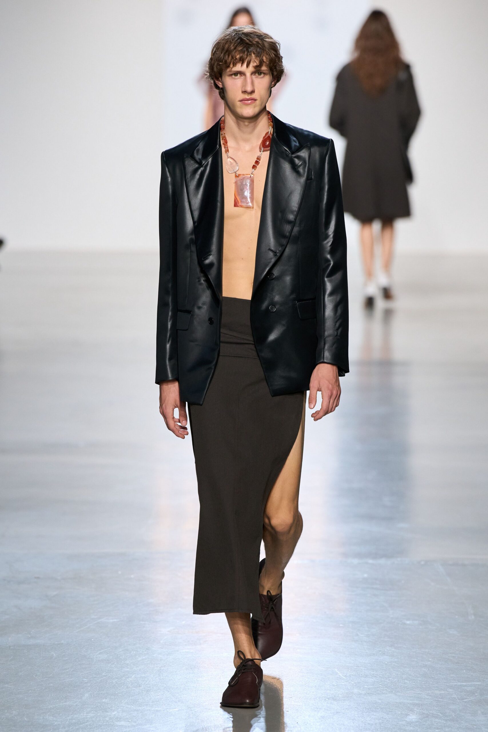 brown jersey asymmetric slit fitted draped flowing skirt