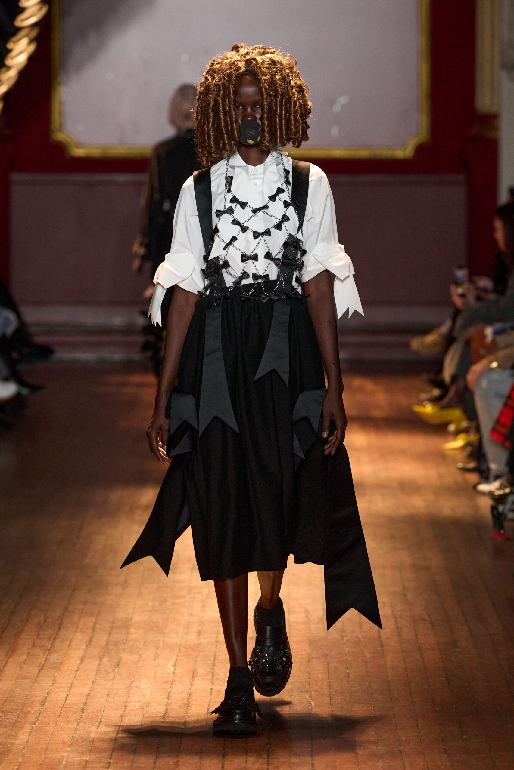 white shirt with chain bow harness