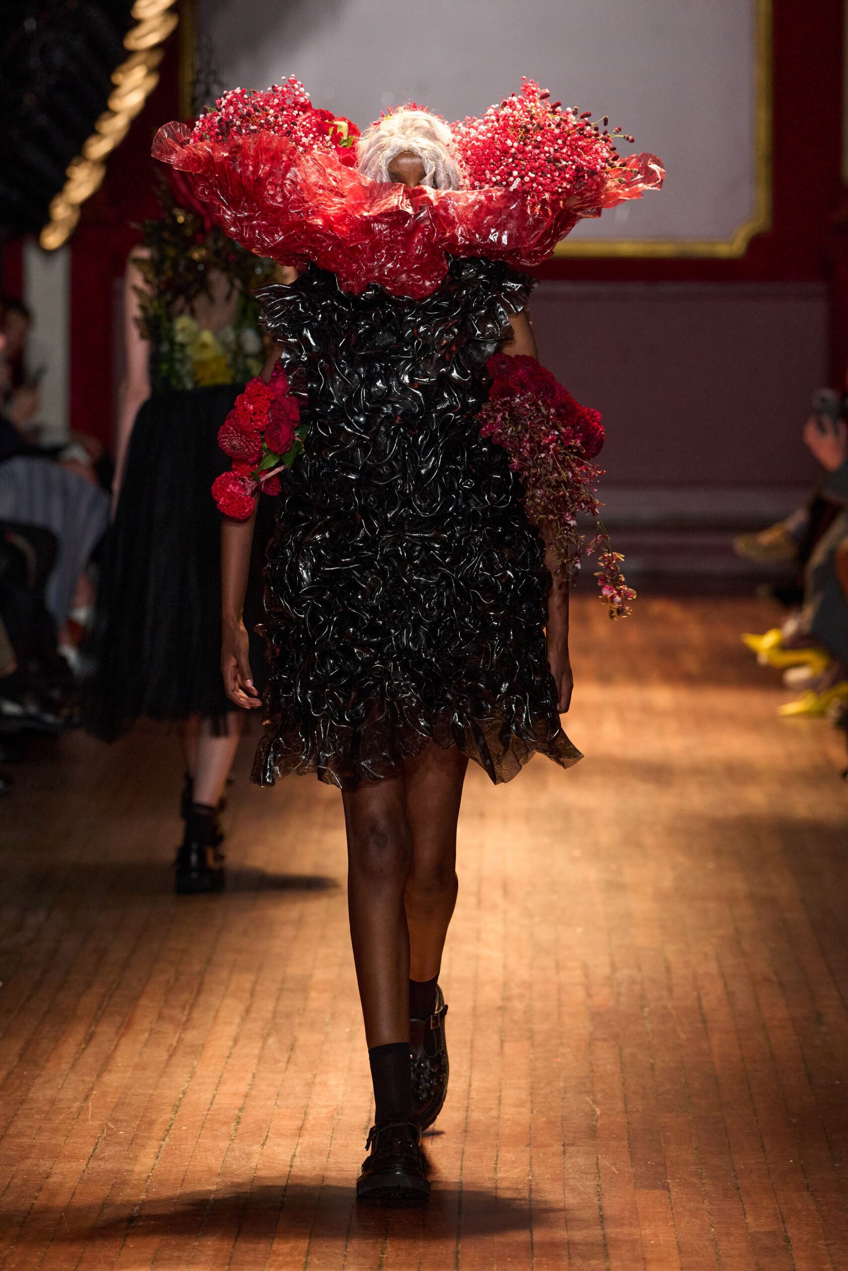 ruffled vinyl mini dress with floral collar
