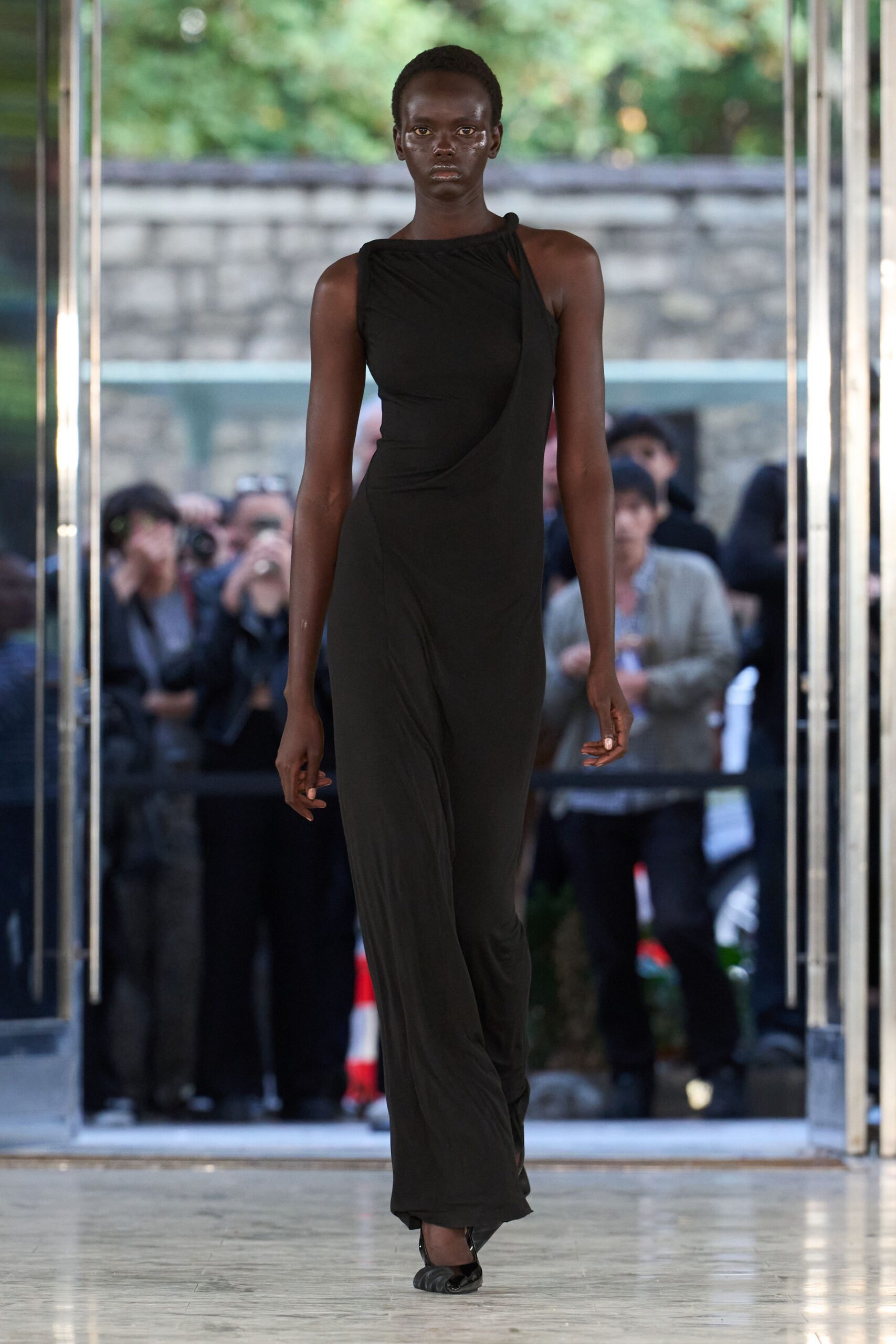 black one-shoulder draped evening gown