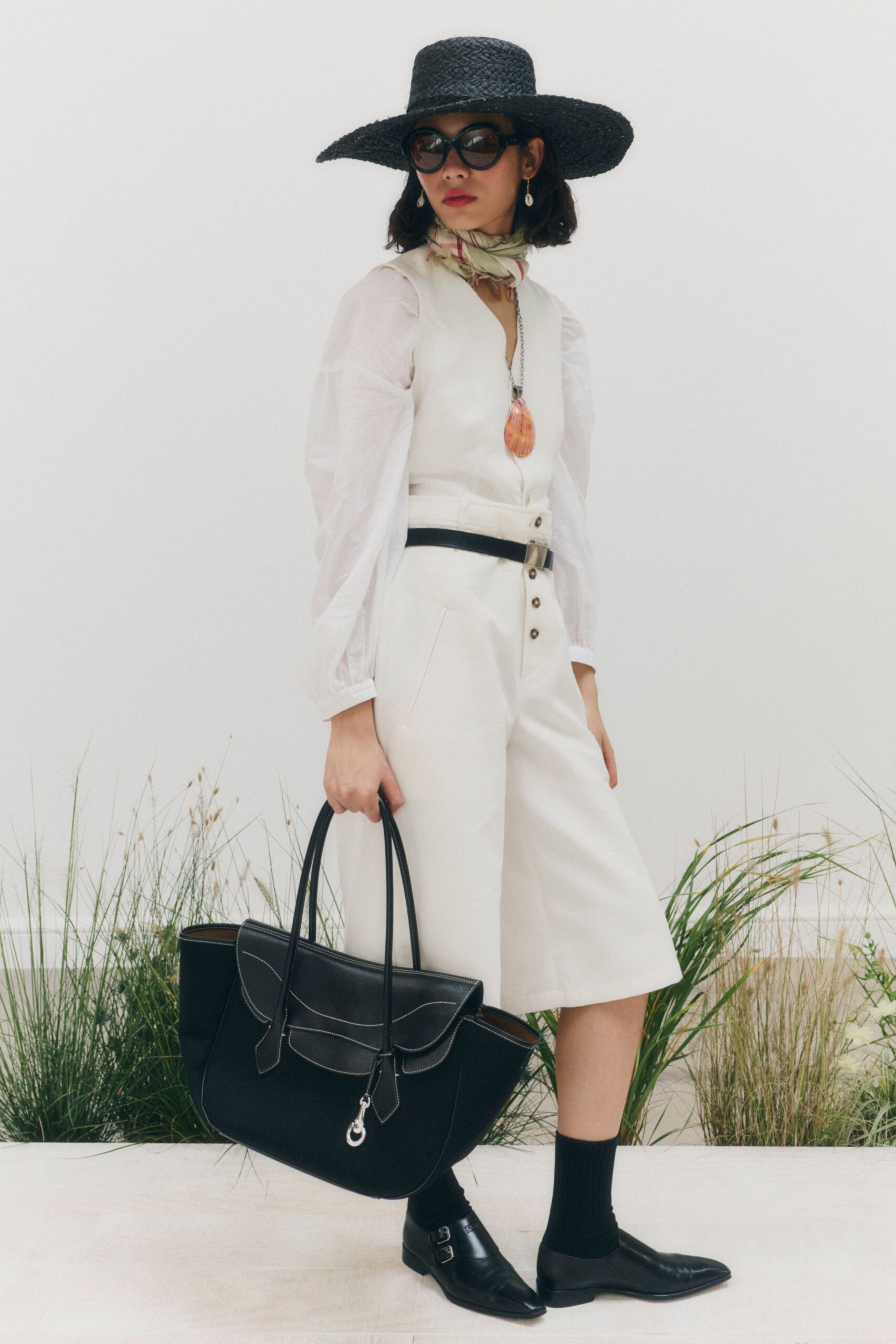 ivory belted jumpsuit with sheer sleeves