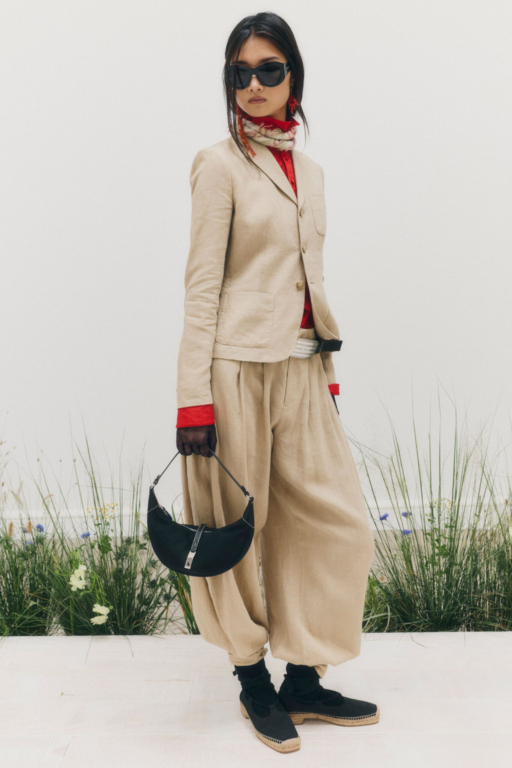 beige linen blazer and draped trousers