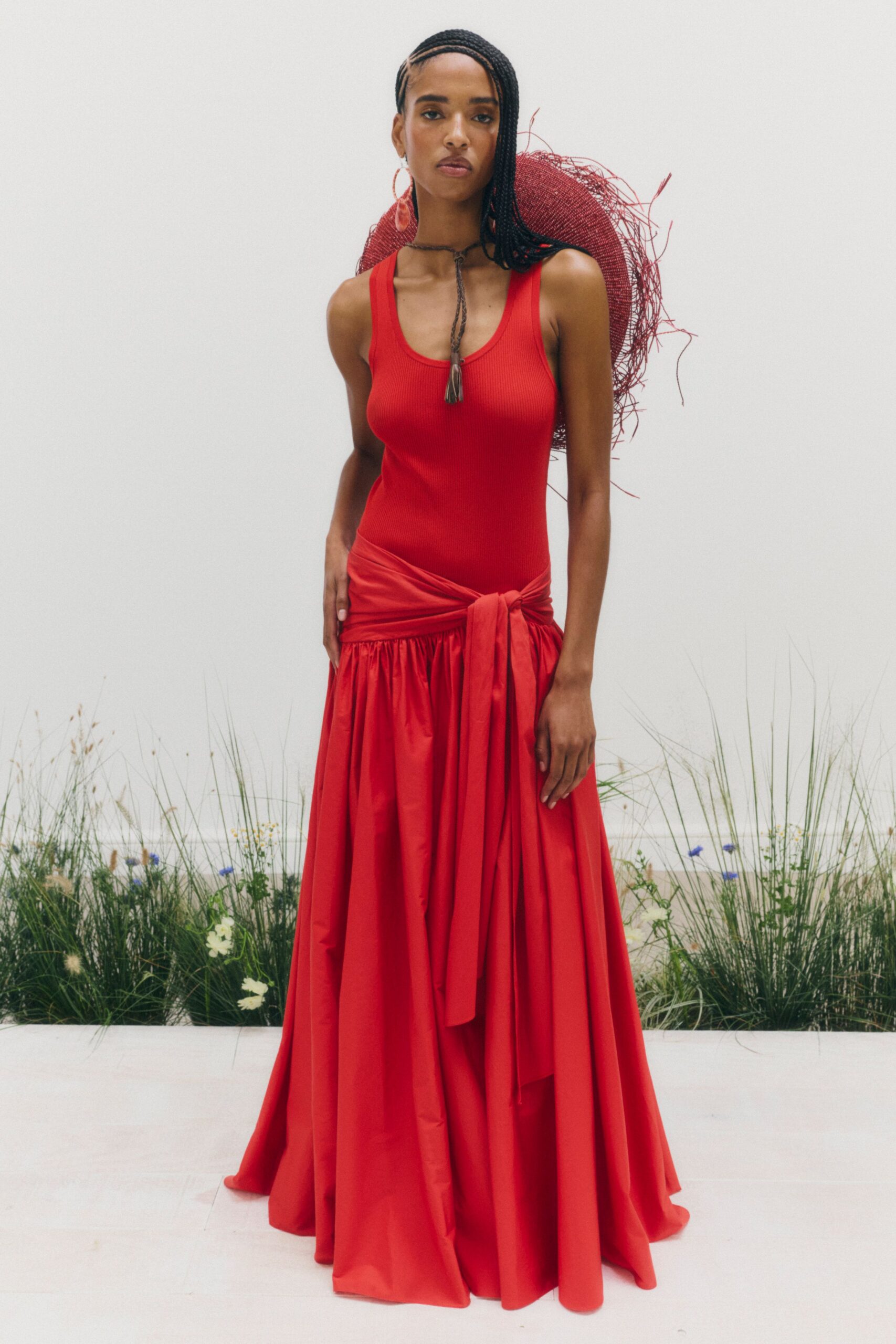 red drop-waist draped gown