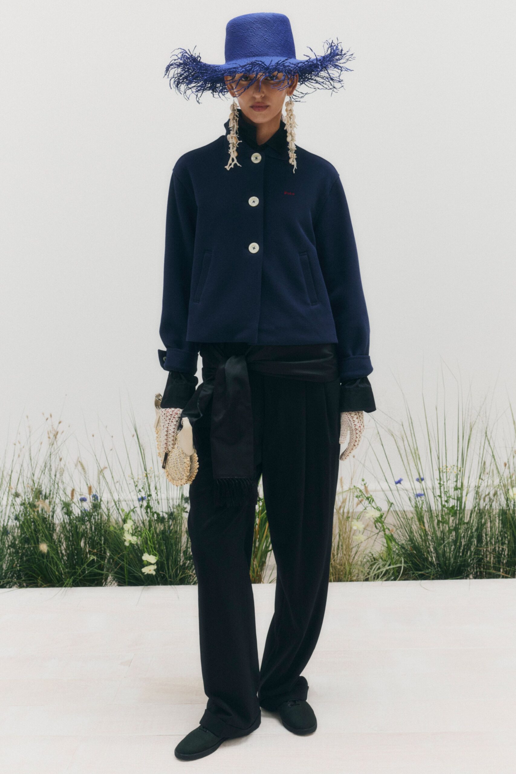 frayed wide-brim blue hat