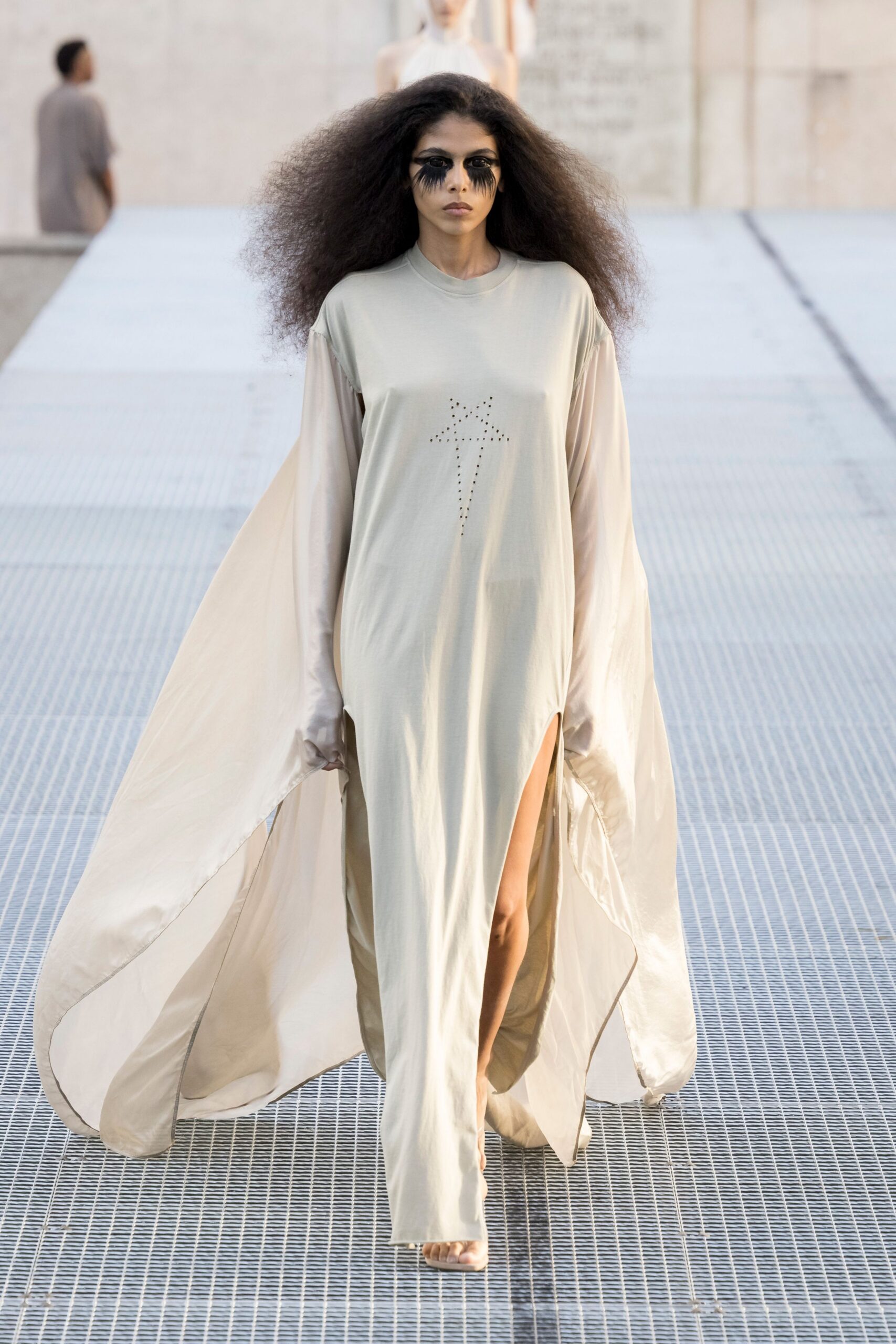 ivory cape-sleeve slit gown