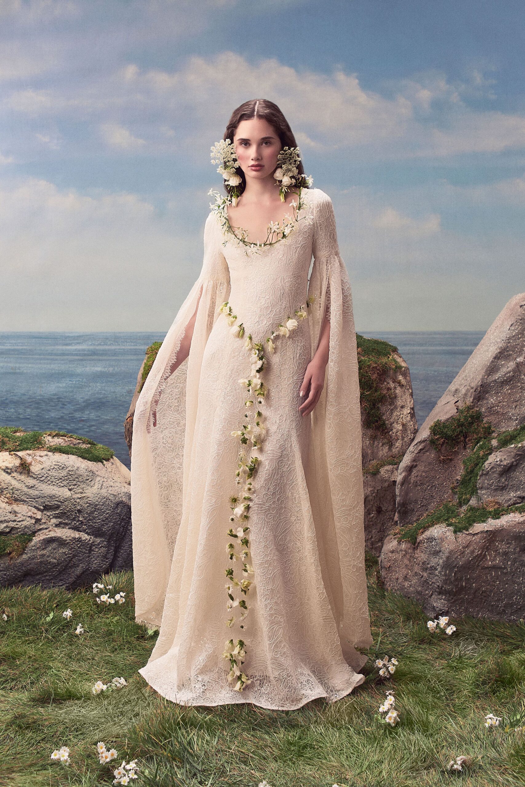 ivory lace cape-sleeve bridal gown