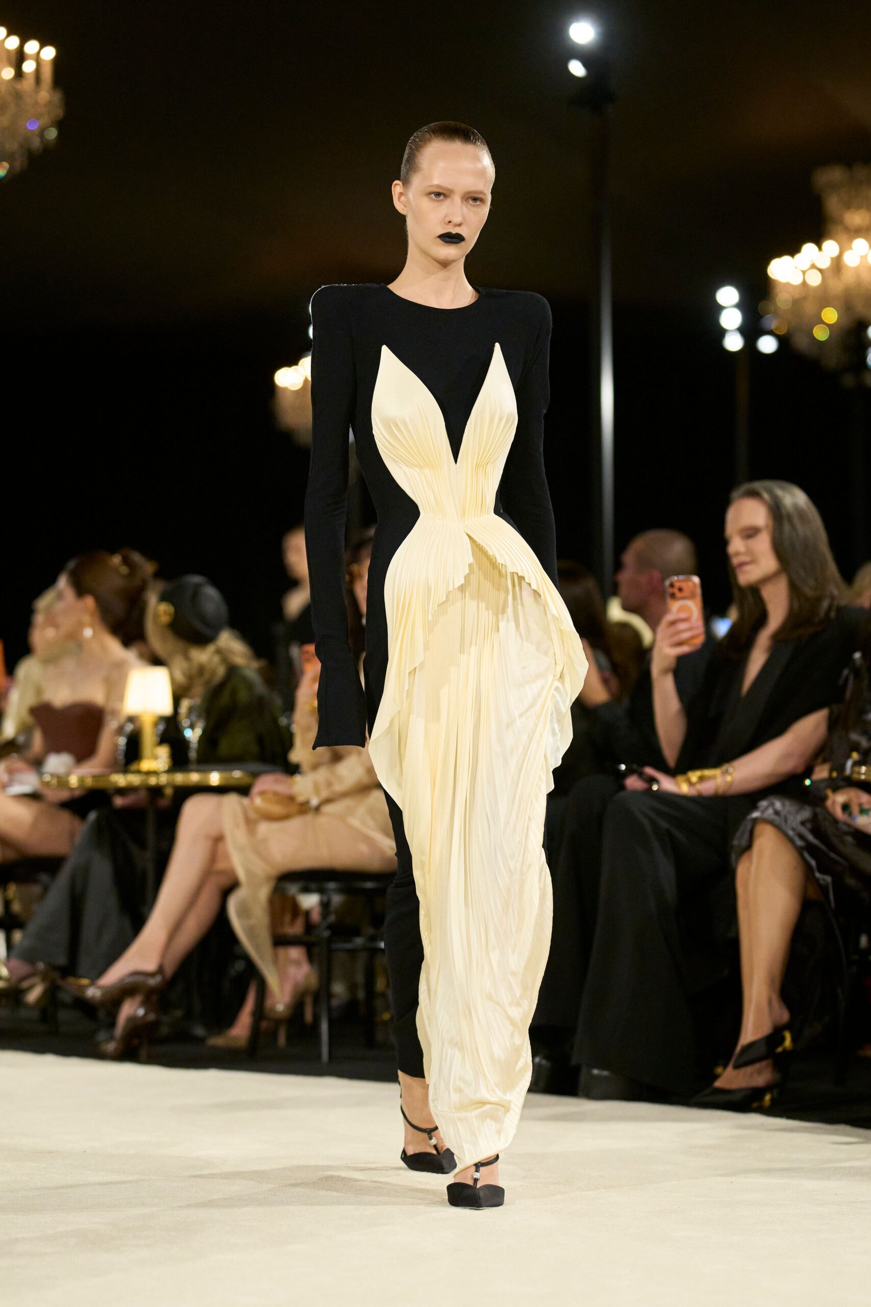black and ivory pleated evening gown