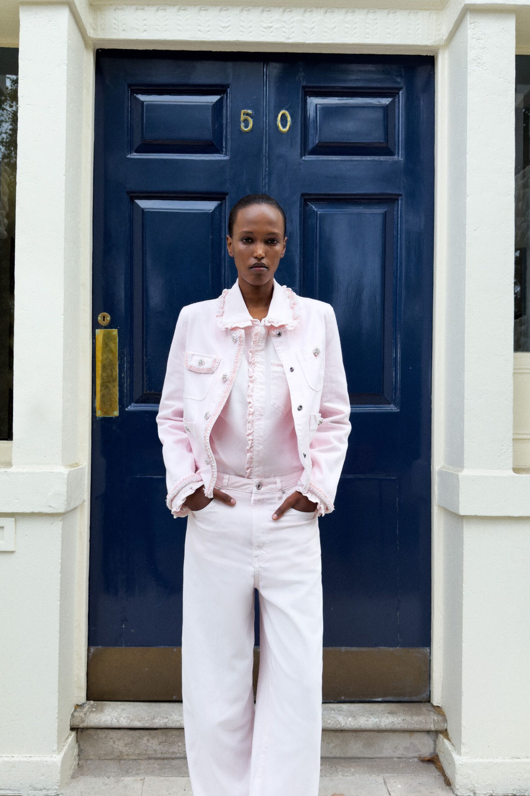 pink collared long-sleeve structured ruffled embellished jacket