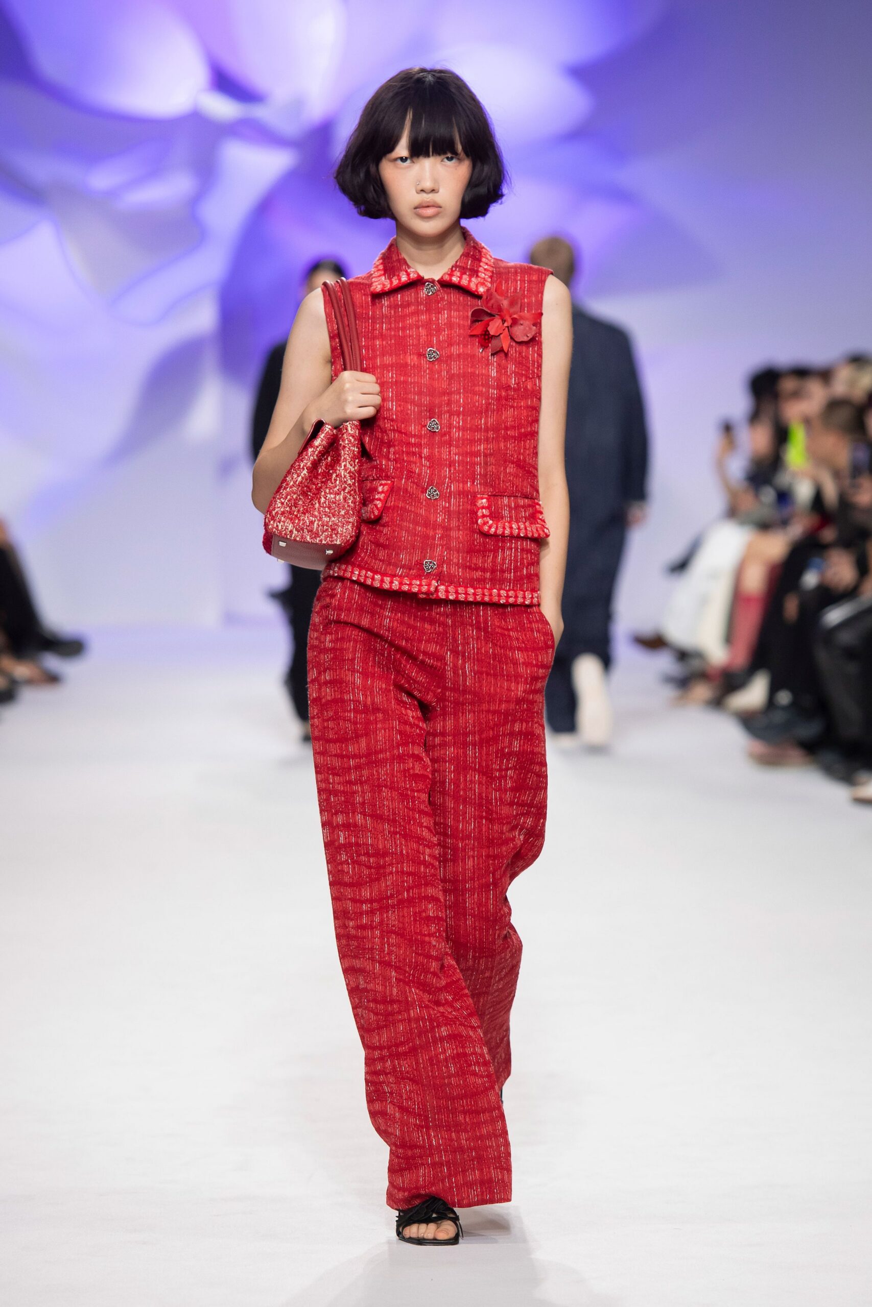 red tweed sleeveless collared structured buttoned pockets vest