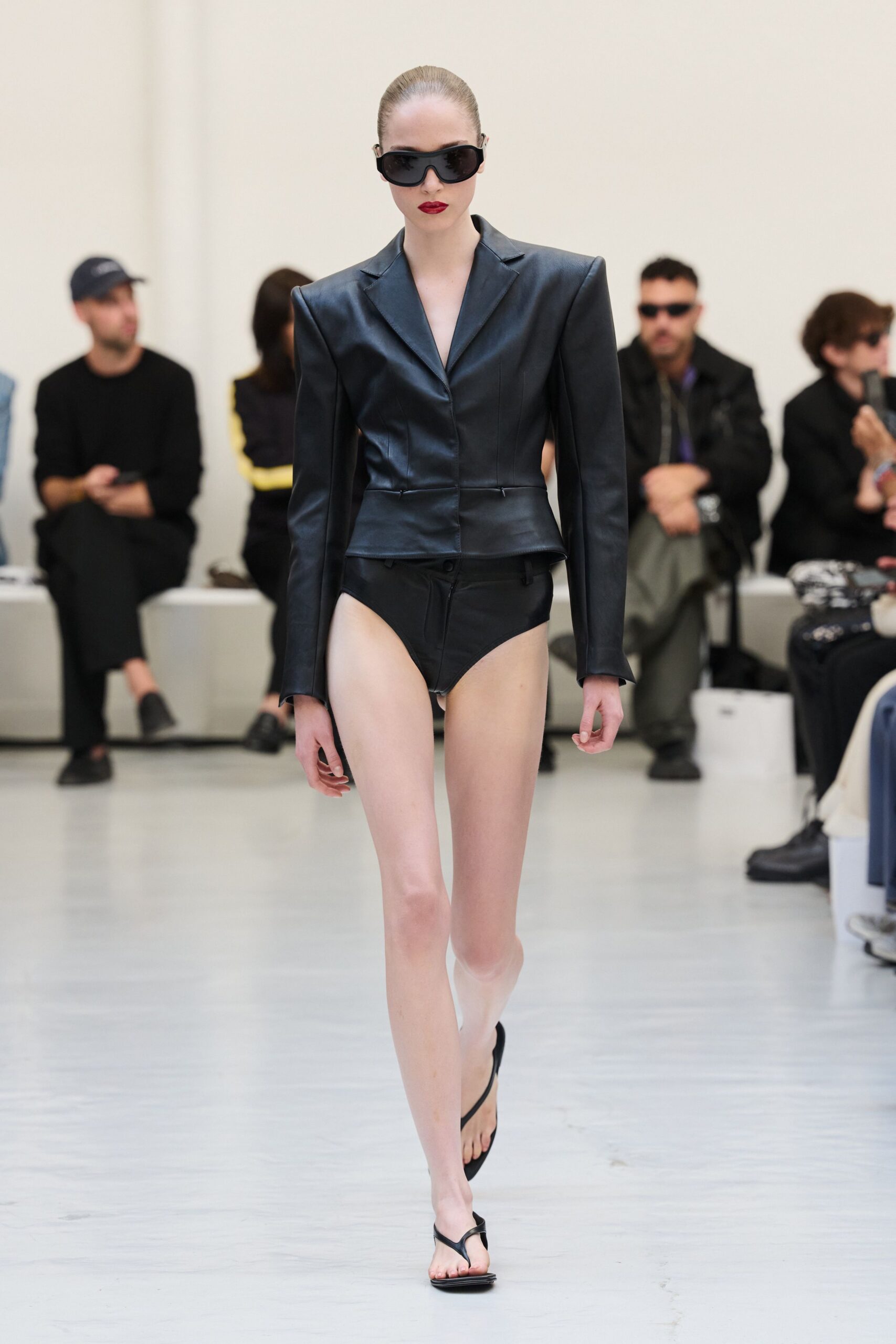black leather long-sleeve collared structured panelled shiny jacket