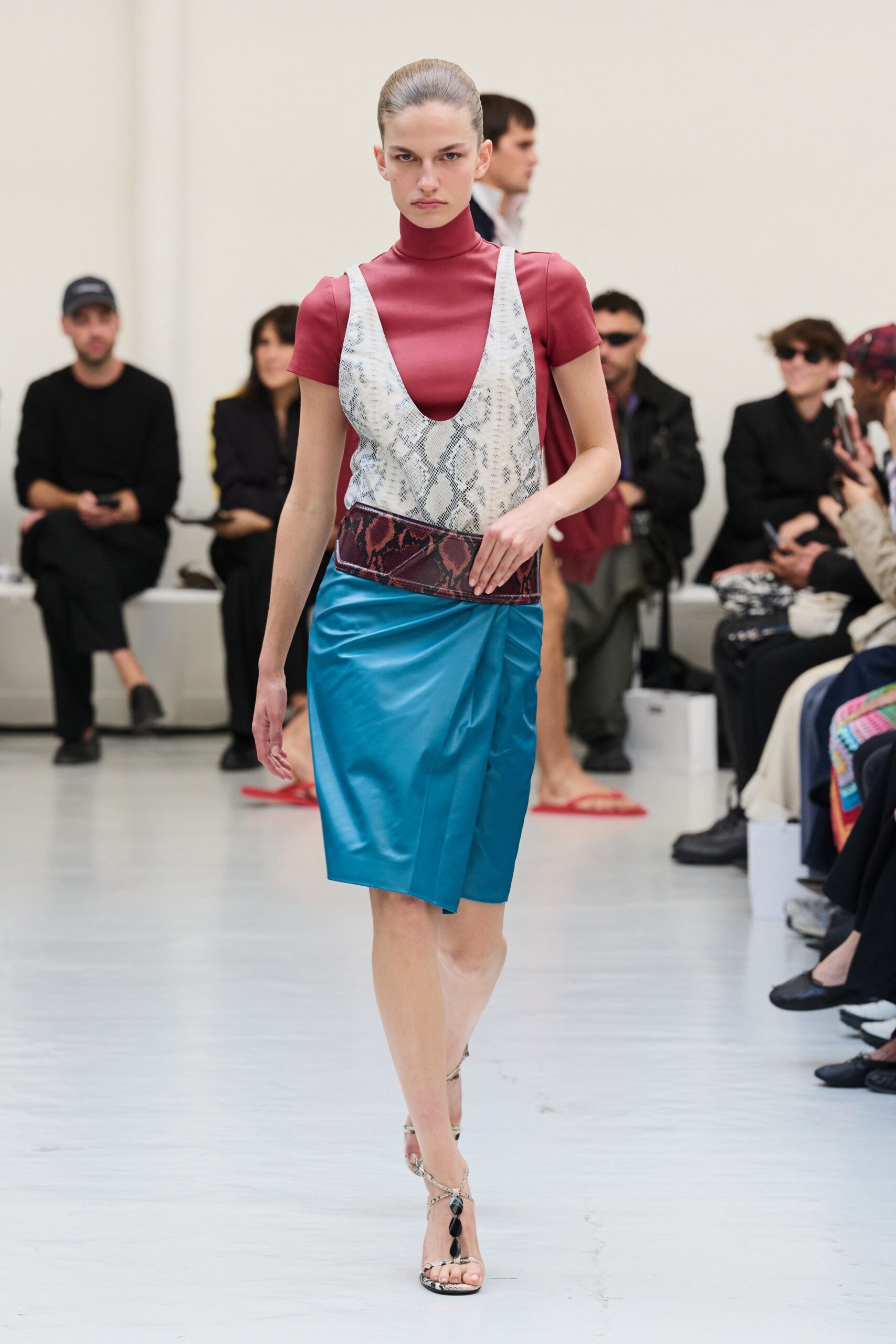 red short-sleeve turtleneck fitted shiny top