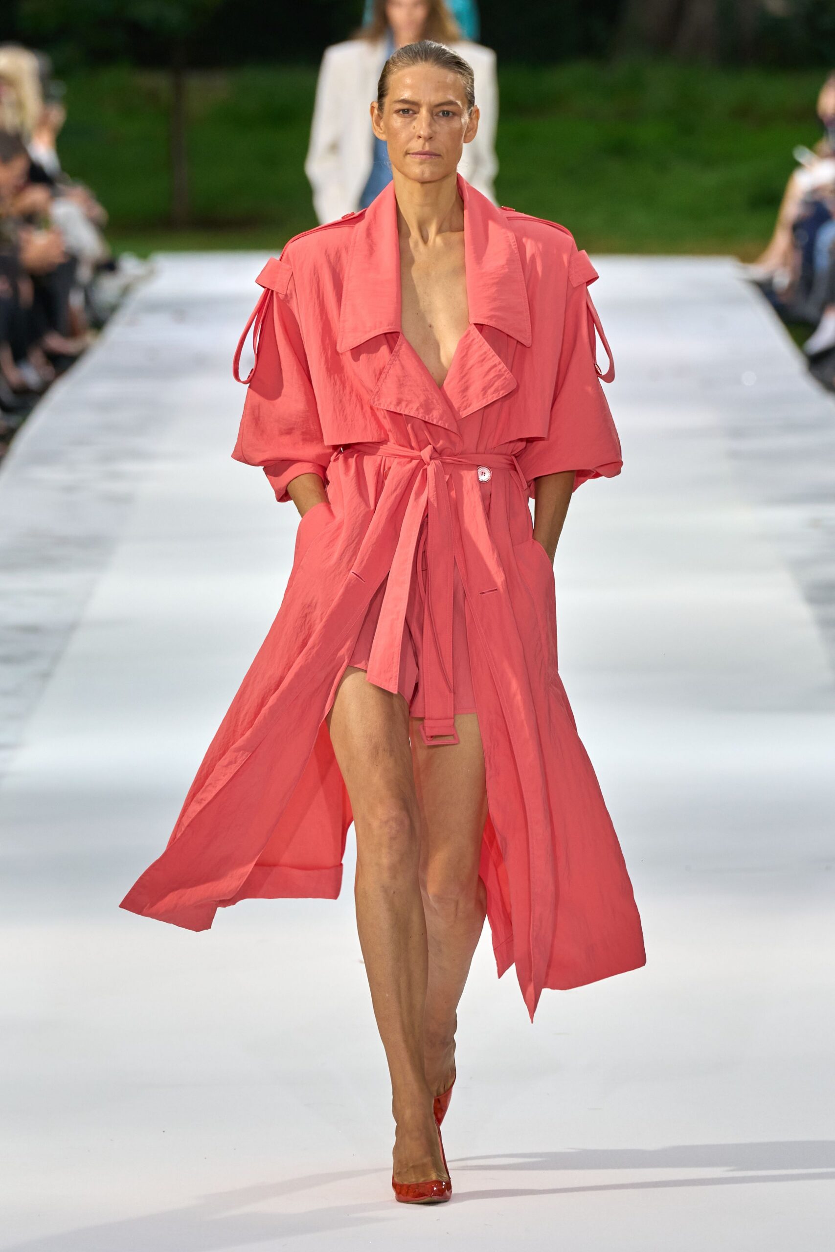 coral belted trench coat