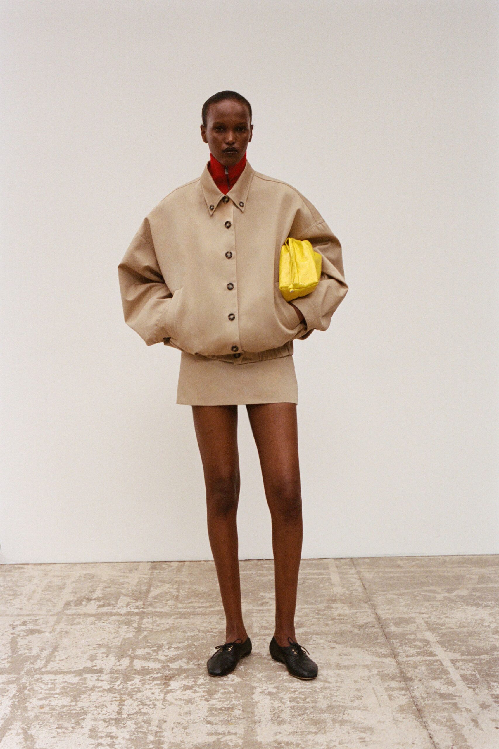 oversized beige leather bomber jacket