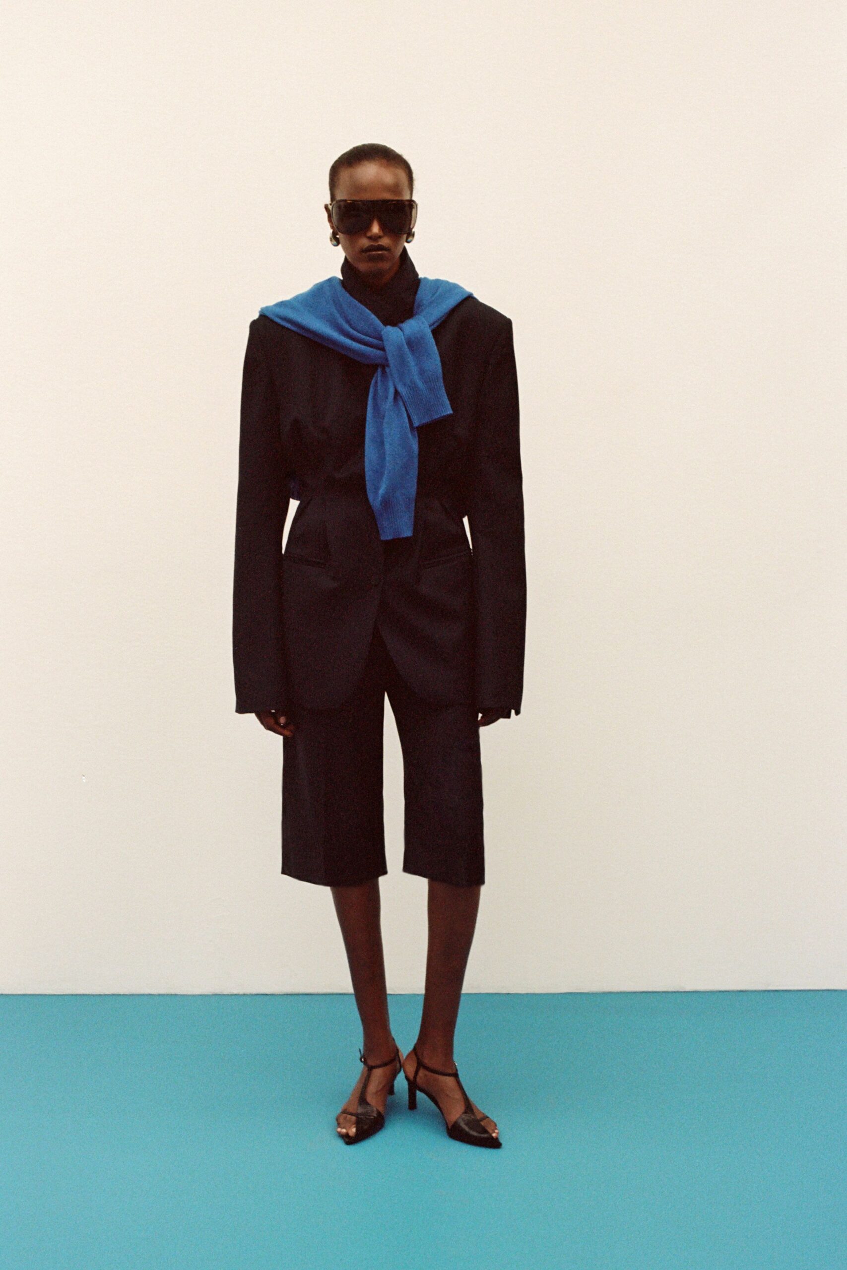 black tailored blazer with shoulder sweater
