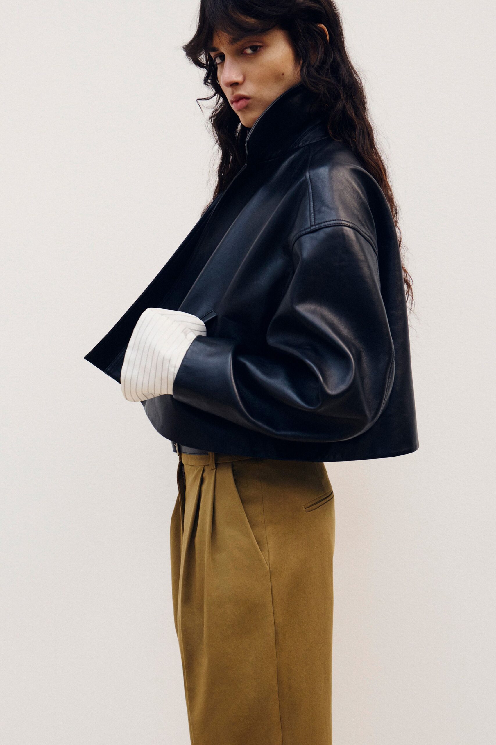 oversized black leather cape-back jacket