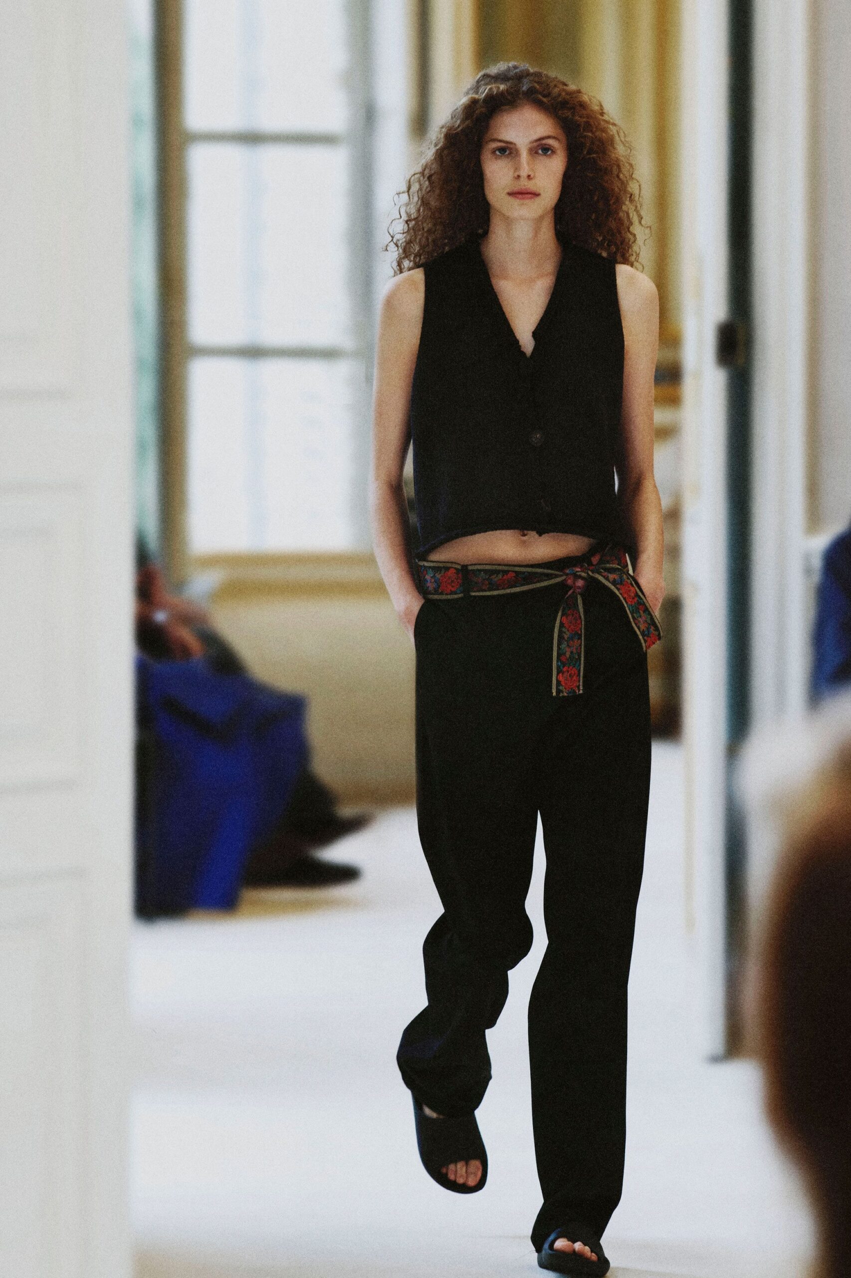 cropped black vest with floral sash