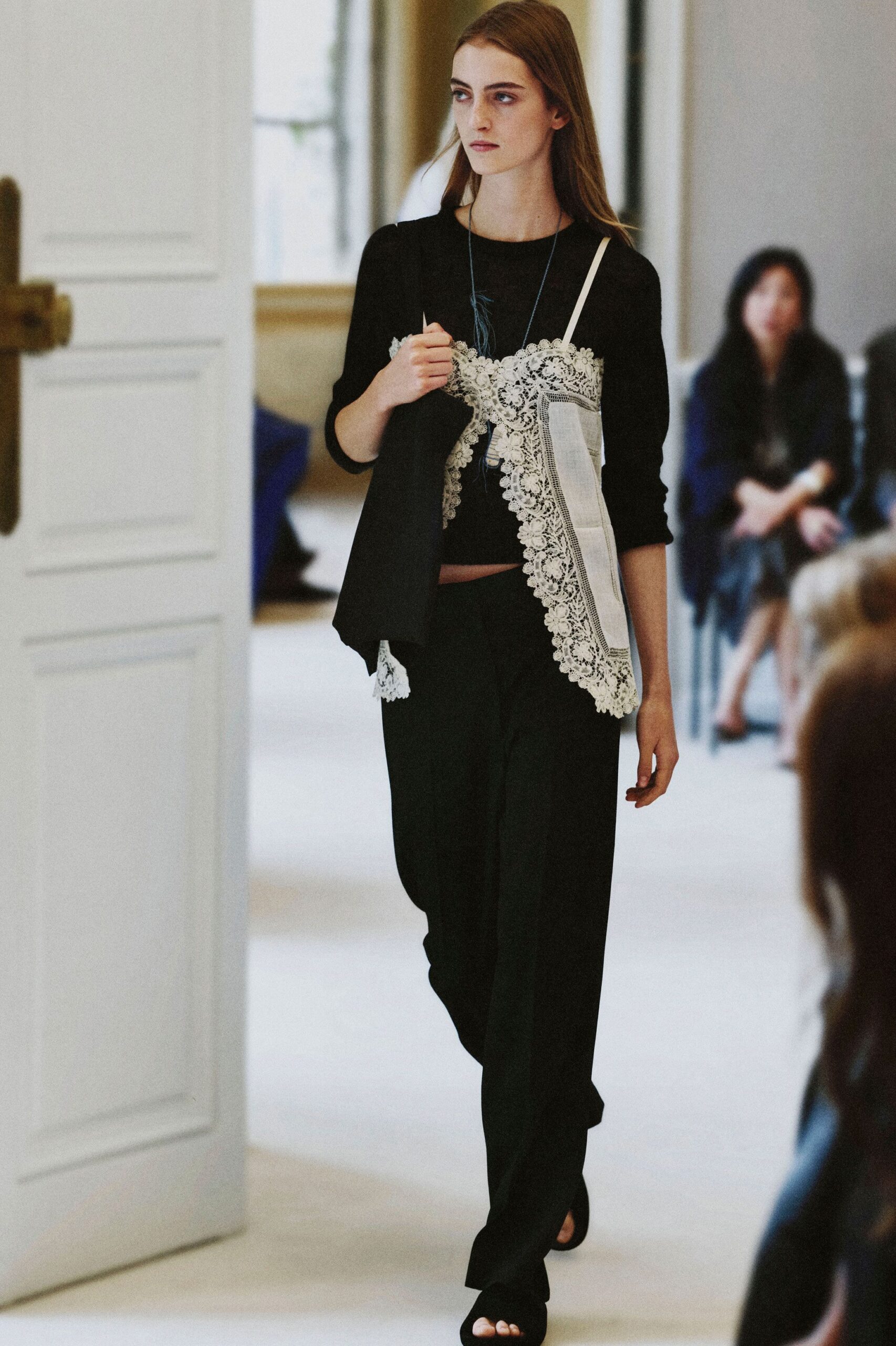 lace apron camisole over black knit top