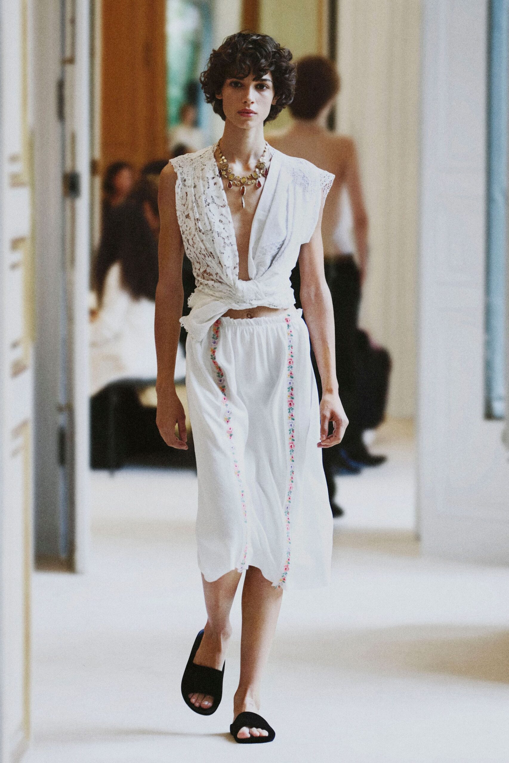 white lace wrap-style cropped top