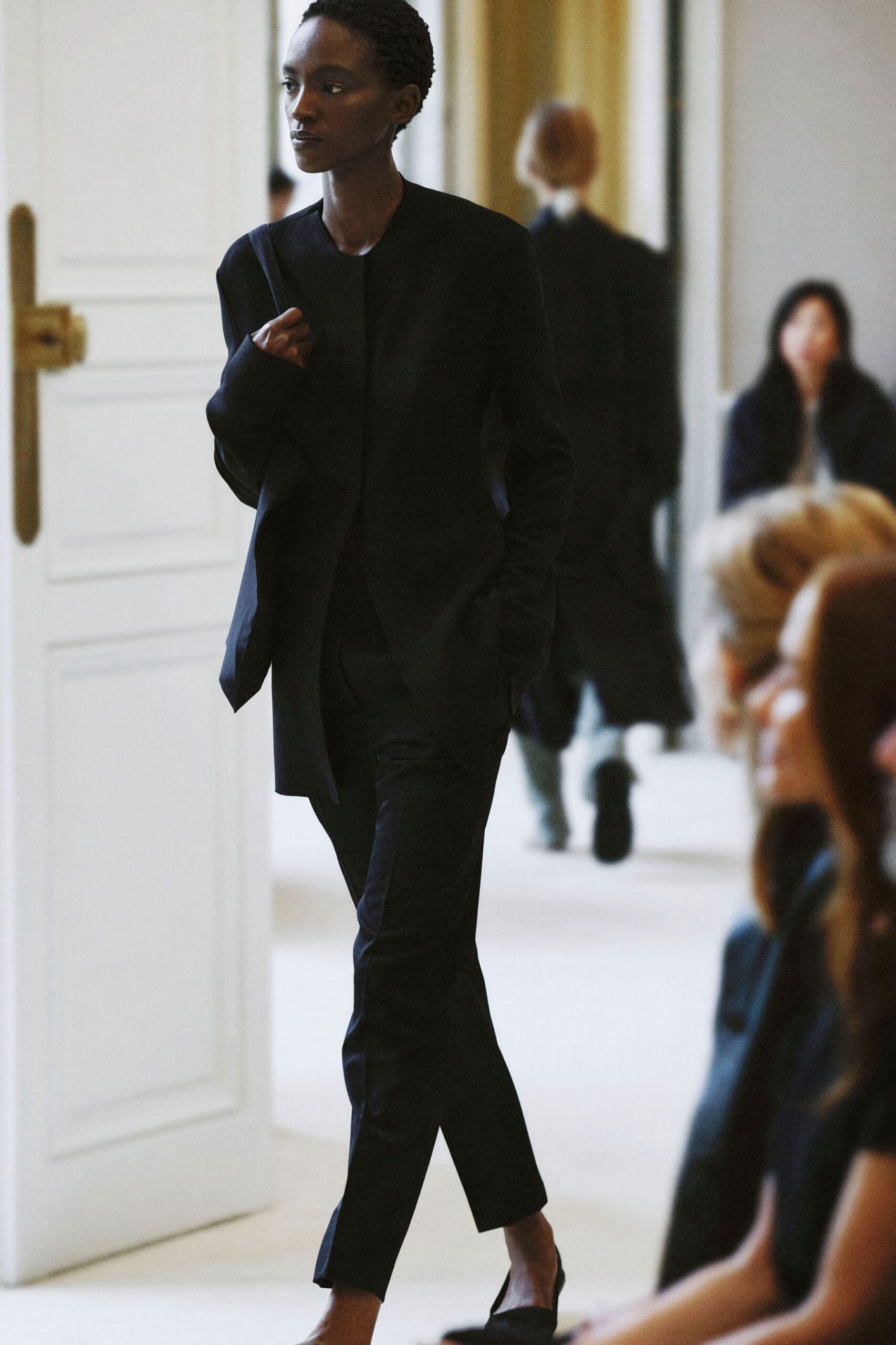 black collarless longline jacket