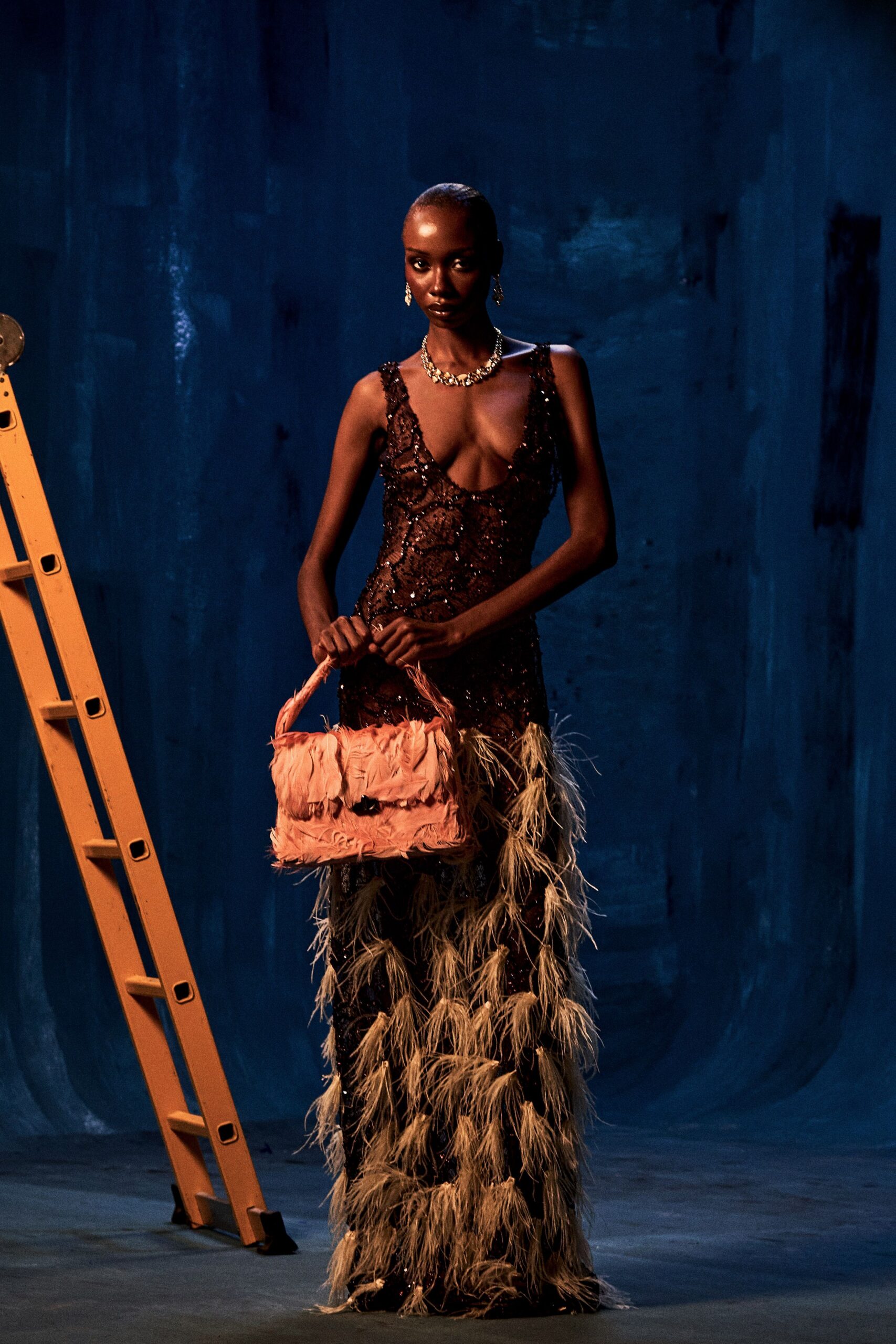 feather-trim sequined evening gown