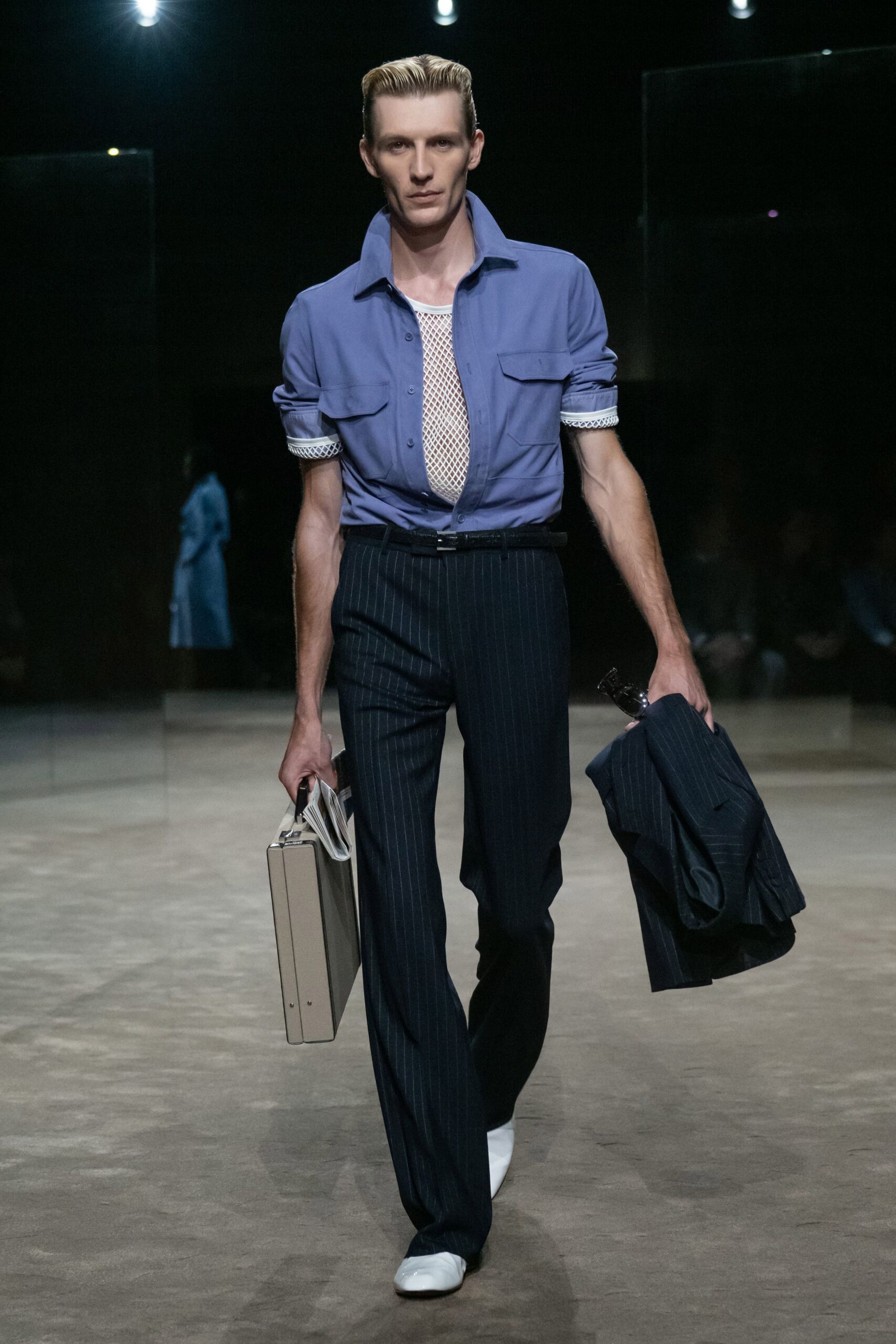 blue open shirt over fishnet tank