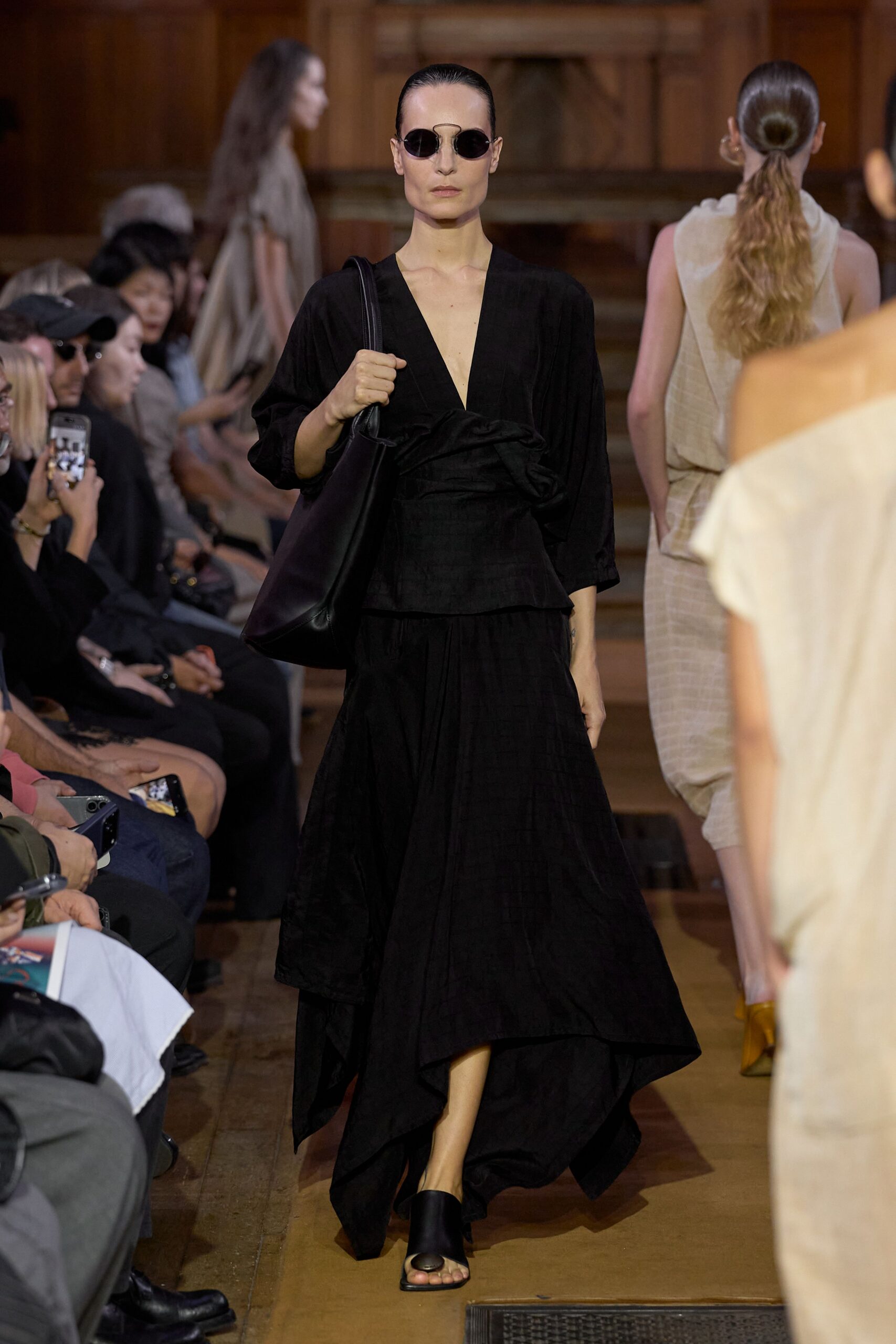 black long-sleeve v-neck draped flowing textured maxi dress
