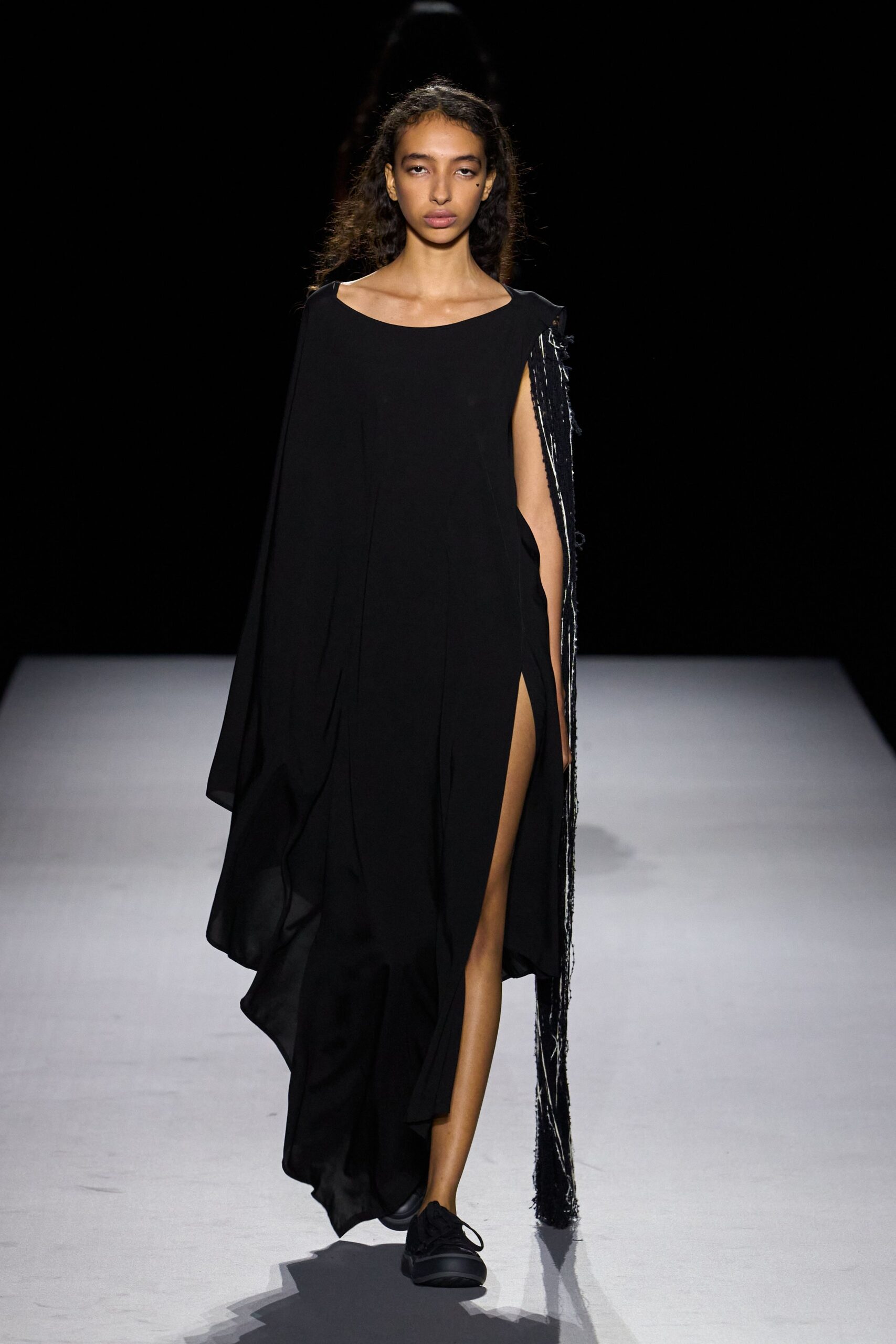 black draped slit evening gown