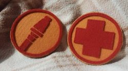 Medic and Soldier emblem badges.
