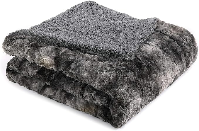 This is such a nice blanket, I've already gotten compliments about it. the warmth this thing gives is great too. I start to sweat at night in the winter. The only downside about this is it will leave little balls of fur. but after a couple uses and washes you should be in the clear.