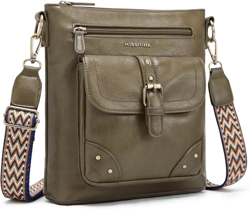 This purse is a great size - small enough for convenience and comfort, but roomy and plenty of space.  Great daily purse. The inside and outside pockets are great for keeping phone, keys, etc. at easy reach. It is an attractive daily purse - I love the look of the strap. It is easier to carry as a shoulder carry than a cross-body. The snap on the very front pocket is placed just a fraction off for quick snapping - I have to look and line it up. But thats a small complaint for an otherwise convenient, comfortable carry purse. I am 5'0 and find the carry strap is a good length for shoulder carry at its shortest length. It has plenty of length to go for taller folks. Under 5'0 could use as a cross-body but may find the strap too long for convenience on the shoulder.