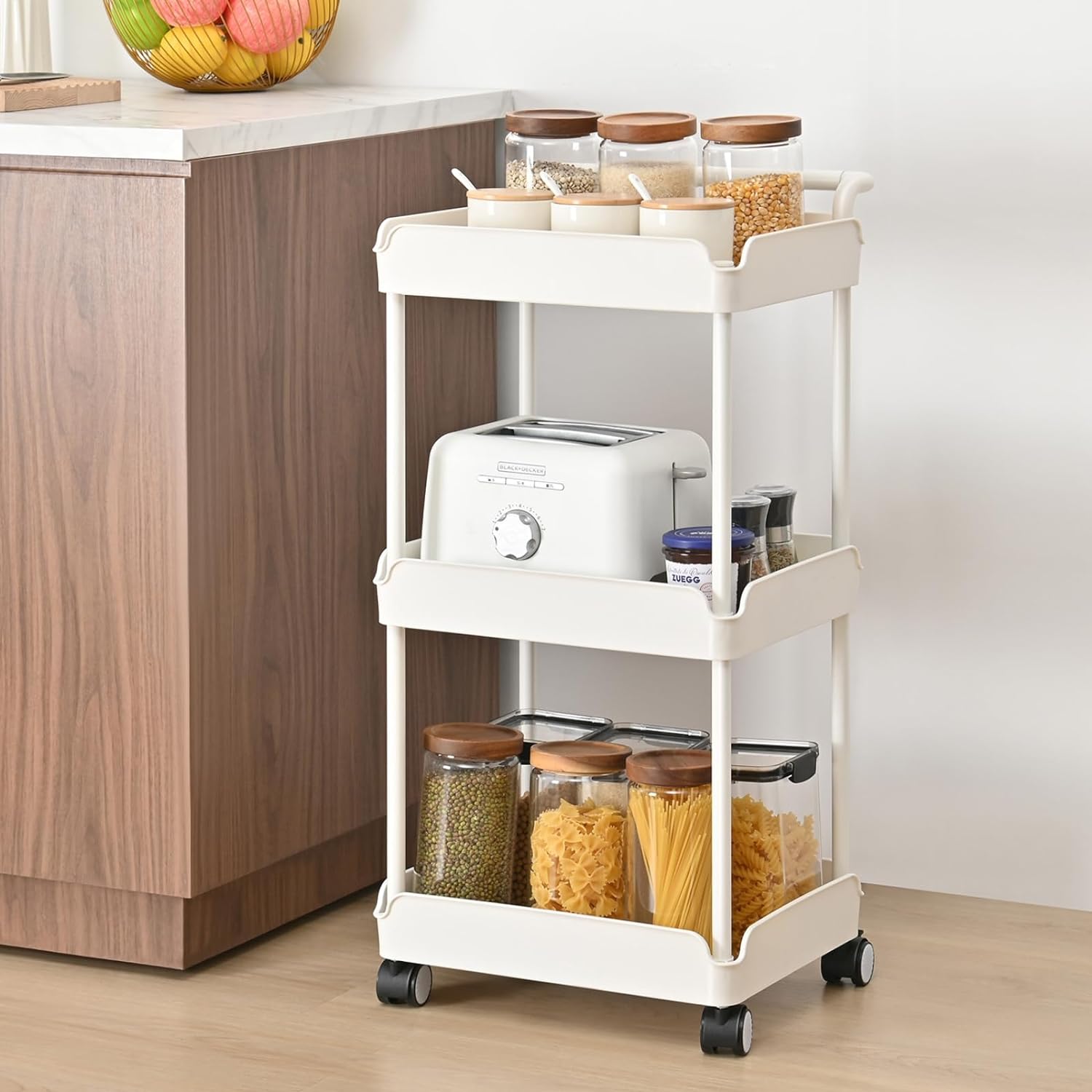 I ordered this rolling storage cart to get my kitchen items organized since I had many items here and there, and it was hard to find them when I needed certain ones. With help from this cart, I can store items on different shelves by categories, and that makes it easy to find my cooking items. I have been using it for a while, and Im satisfied with it.