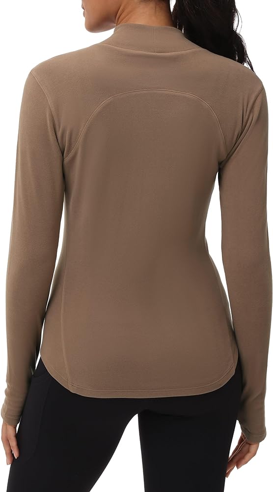 I'm a repeat customer of THE GYM PEOPLE, and their Fleece Mock Turtleneck Pullover Base Layer Shirts continue to impress! This isn't my first purchase from them, and just like their other tops, this one is top-notch. The fleece material is incredibly soft and cozy, perfect for chilly workouts or as a base layer during outdoor activities. The mock turtleneck design adds extra warmth without feeling too restrictive. The long sleeves are great for added coverage, and the overall fit is flattering and comfortable. THE GYM PEOPLE consistently delivers on quality and style, making their workout tops a staple in my activewear collection. Highly recommended!