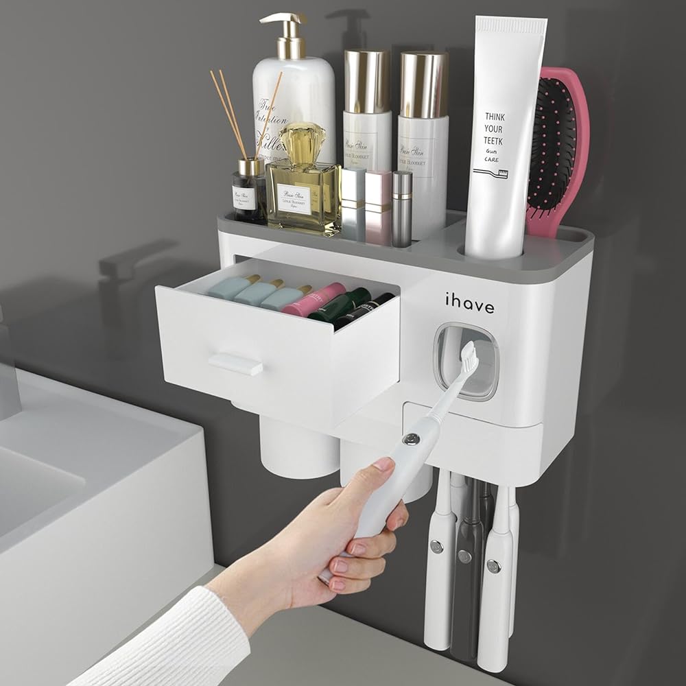 This is really cool and functional! Keeps everything nice and organized and my bathroom counter is no longer cluttered with everything. The toothpaste dispenser is SO helpful - just put the toothpaste tube in at the top and you press your toothbrush against the lever below and a perfect amount comes right out 😀It comes with a sticky strip to attach it to the wall but it didnt stay put. Maybe it was due to the texture of my wall but I ended up using some anchors and screwing it directly into the wall.Definitely recommend this if youre looking to organize your toiletries and such 👍👍