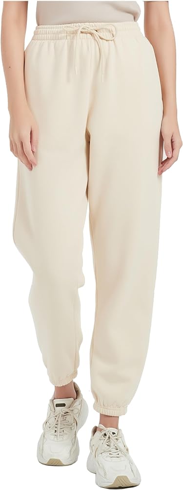 Love these pants! Perfect bagginess for small figure, I'd say like a ladies size small size 4 for heights from 5'3" to 5'6. Otherwise will start to be a bit short for those trying to stay warm around the ankles. I'm almost 5'5" (5' 4" 3/4) and they are the perfect length for me. If you have a larger waist for your proportions these likely will not be comfortable in small, but you could size up since their bagginess is moderate. I haven't washed them yet, but I'm going to put them in a mesh bag and only put them in low dryer for about 5 minutes to fluff, shake and let them air dry. The cotton blend is fabulous on these. I'd prefer they didn't shrink (or wear out) at all thus the precautions. I have them in multiple colors. Love, love, love them. I don't know how I've lived without them. High waist keeps you nice and cozy and you can be active (exercise) and toasty (internet) around the house. They look great for shopping trips too when paired with the right tops. Cute and comfy!