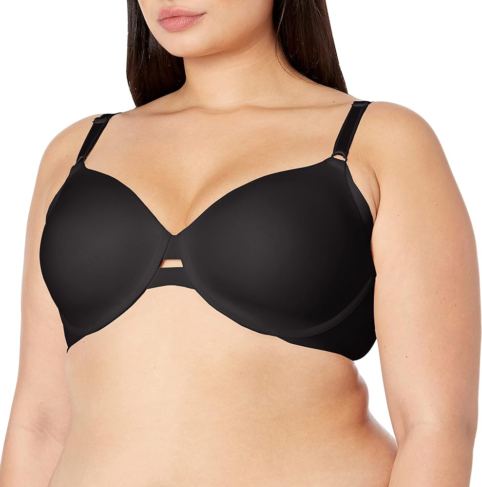 This bra is SO comfortable. It doesn't cut in under my arms, it's designed to smooth the pudge there and it actually does! It's comfy and secure and fits perfectly. True to size in my case. The adjustment for the length of the shoulder straps are in front too!! Sooooo much easier that way! Highly recommend this bra, it's well worth it