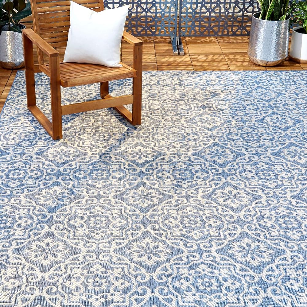 &nbsp;I bought two of the 79 x 102 New York Patio Country Danica Trasitional Geometric indorr/outdoor area rugs in  Blue/Grey in August of 2020 on Amazon for $112 each.I have a large outdoor space (1,000 sq ft) with a kitchen, seating area and dinning room. One of the rugs I use in the fireplace seating area that is uncovered and mostly shaded. The other I use in the dining area, also uncovered, but gets full sun.Review:Unpackaging:They arrive well packaged and were easy to lay out. Like all new rugs, the ends and corners curl at first. But after a few days with various things of weight (potted plan, deck chair ect.) on the curling areas, it layed flat as can be and has stayed that way since. A common complaint of online rugs is the chemical smell some have when you first unroll them. No issue here.Appearance:This is an attractive rug. It has all the look and feel (and ware) of a much, much more expensive rug. The way the entire fabric weave has hints of both colors (blue and white for mine) throughout makes it look like a much more luxurious rug and the pattern is perfectly proportionate to the area it covers (79 x 102 in my case). For me these two rugs anchor my large outdoor space. Added bonus, and this is strictly luck, the pattern is the negative to the tile on the fireplace! (see pictures)Maintenance:I have left these rugs out since I purchased them in summer 2020. One rug is located in a damp, shaded area. Over the winter each year this rug seemed to stay damp and resulted in a slight moss covering turning the rug an unappealing blue-green. The other, in full sun, also got a lighter coat of moss too. But when I was ready to use the outdoor space again in the spring it only took an hour or two to whip them back into usable shape. With such a large outdoor space of treated lumber, I invested $200 in a powerwasher a few years back (link below). The power washing, and a spray of diluted Dawn dish soap on the tough spots was all they needed for them to look new again. The power washer makes light work of it, but you can substitute more elbow grease in its place. Just add a couple more hours and more Dawn solution to this once a year task and you will be happy.Conclusion:For any product to get a 5 star rating is a very uphill battle. But for me, I am hard pressed to find a negative for this product. Im going into my third year with these rugs, and they only cost me $112 each. That works out to under $40 a year so far with at least 2, or 3, or many more years left of service. My friends, that is a good purchase in my book.Power Washer -Amazon - June 2019 - $199.99 (AR Blue Clean AR390SS Electric Pressure Washer 2000 PSI, 1.4 GPM)https://www.amazon.com/gp/product/B00N6XBM64/ref=ppx_yo_dt_b_asin_title_o08_s00ie=UTF8&psc=1April 2022 price - $220This set of 4 pillow cases (under $20) work perfectly with the rug  - https://www.amazon.com/gp/product/B07XHMDMY1/ref=ppx_yo_dt_b_asin_title_o06_s00ie=UTF8&psc=1